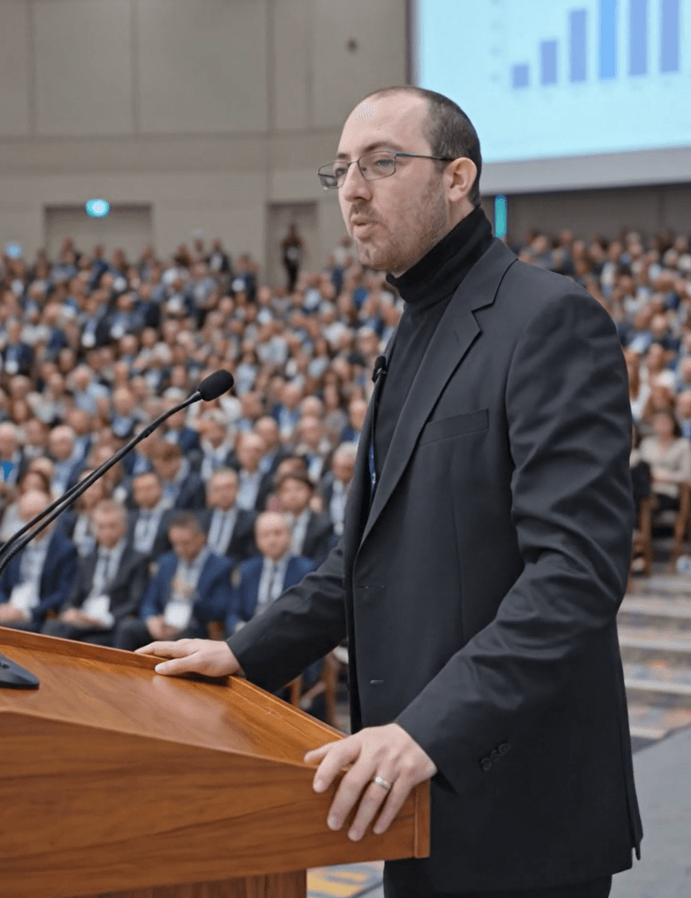 Thomas EC. Smith speaking at a conference